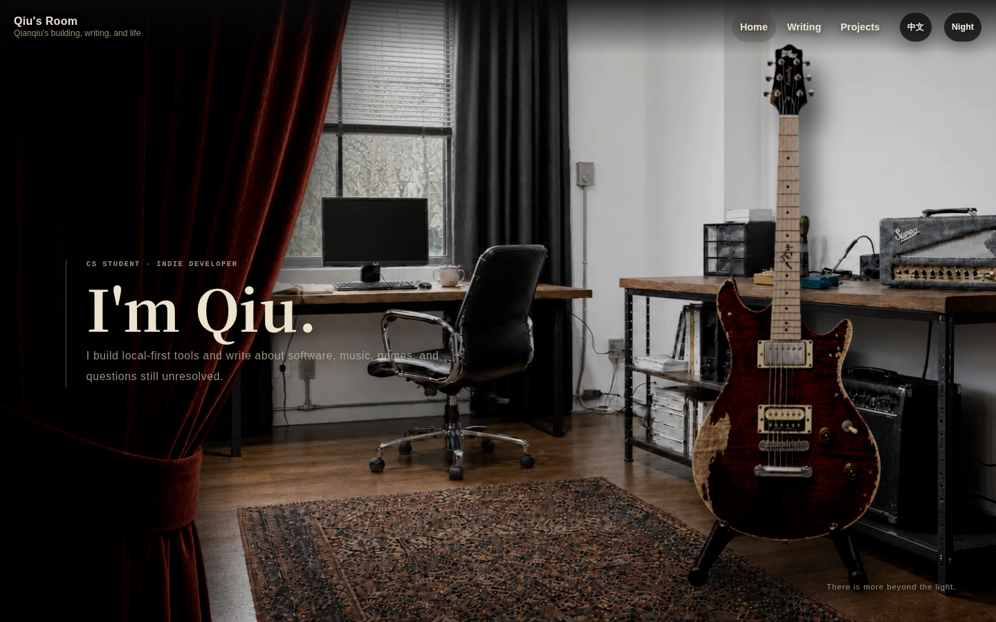 Qiu's personal room with a guitar under warm light